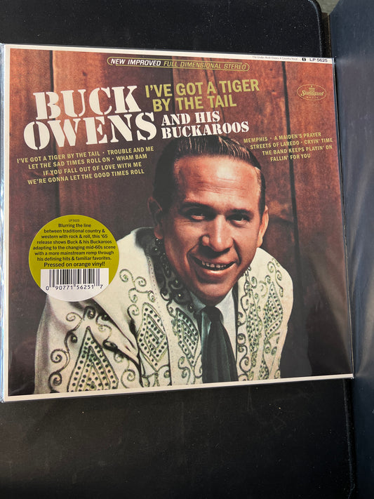 BUCK OWENS - I’ve got a tiger by the tail